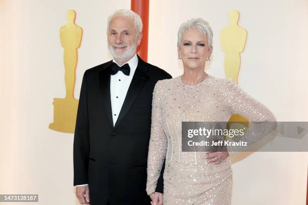 Christopher Guest and Jamie Lee Curtis attend the 95th Annual Academy Awards on March 12, 2023 in Hollywood, California.