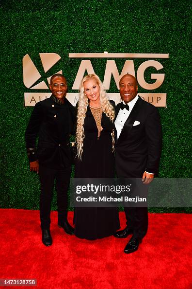 Tommy Davidson, Amanda Moore and Byron Allen arrive at Byron Allen's