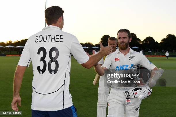 Kane Williamson of New Zealand is congratulated by Tim Southee of New Zealand after winning the First Test match in the series between New Zealand...