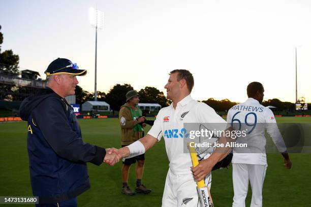 Neil Wagner of New Zealand is congratulated by Coach Chris Silverwood of Sri Lanka during day five of the First Test match in the series between New...