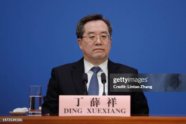 China's newly elected Vice Premier Ding Xuexiang holds his first press conference at the Great Hall of the People on March 13, 2023 in Beijing,...