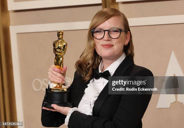 Sarah Polley, winner of Best Adapted Screenplay award for ’Women Talking’ poses in the press room during the 95th Annual Academy Awards at Ovation...