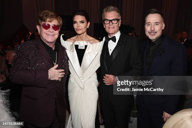 Elton John, Lisa Rinna, Harry Hamlin, and David Furnish attend the Elton John AIDS Foundation's 31st Annual Academy Awards Viewing Party on March 12,...