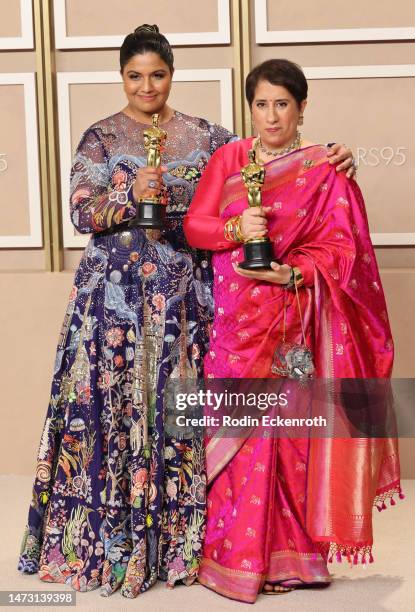 Kartiki Gonsalves and Guneet Monga, winners of the Best Documentary Short Film award for "The Elephant Whisperers," pose in the press room during the...