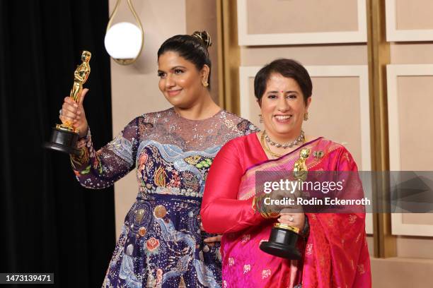 Kartiki Gonsalves and Guneet Monga, winners of the Best Documentary Short Film award for "The Elephant Whisperers," pose in the press room during the...