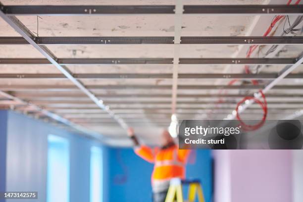 fitting a suspended ceiling - suspended ceiling stock pictures, royalty-free photos & images
