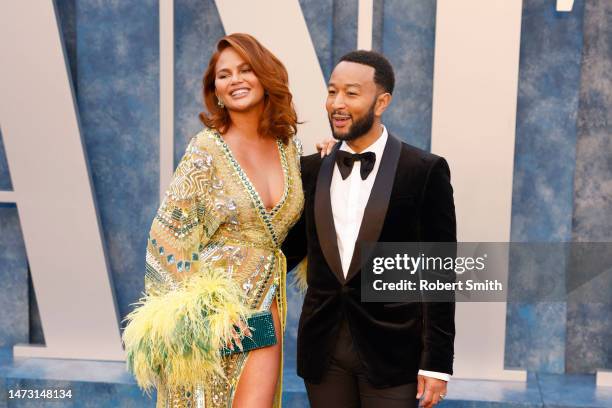 Chrissy Teigen and John Legend attend the 2023 Vanity Fair Oscar Party Dinner Arrivals at Wallis Annenberg Center for the Performing Arts on March...