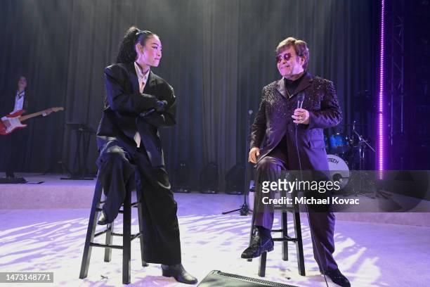 Rina Sawayama and Elton John perform onstage during the Elton John AIDS Foundation's 31st Annual Academy Awards Viewing Party on March 12, 2023 in...