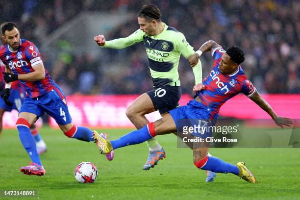 Jack Grealish of Manchester City runs with the ball whilst under pressure from Nathaniel Clyne of Crystal Palace during the Premier League match...