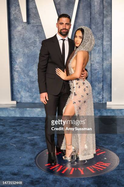 Sebastian Lletget and Becky G attend the 2023 Vanity Fair Oscar Party Hosted By Radhika Jones at Wallis Annenberg Center for the Performing Arts on...