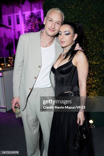 George Daniel and Charli XCX attend the 2023 Vanity Fair Oscar Party Hosted By Radhika Jones at Wallis Annenberg Center for the Performing Arts on...
