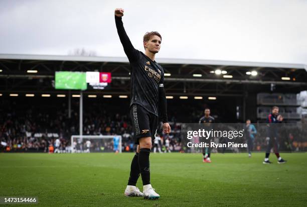 Martin Odegaard of Arsenal celebrates post match during the Premier League match between Fulham FC and Arsenal FC at Craven Cottage on March 12, 2023...