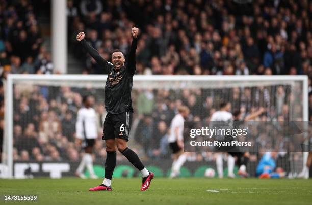 Gabriel Magalhaes of Arsenal celebrates after Gabriel Martinelli of Arsenal scores the team's second goal during the Premier League match between...