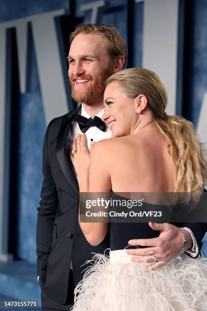 Wyatt Russell and Meredith Hagner attend the 2023 Vanity Fair Oscar Party Hosted By Radhika Jones at Wallis Annenberg Center for the Performing Arts...