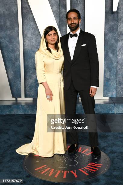 Malala Yousafzai and Asser Malik attends the 2023 Vanity Fair Oscar Party Hosted By Radhika Jones at Wallis Annenberg Center for the Performing Arts...