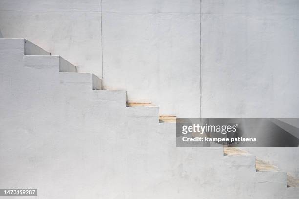 steps against white wall in modern building - stairs business stock pictures, royalty-free photos & images