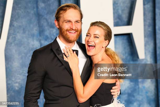 Wyatt Russell and Meredith Hagner attend the 2023 Vanity Fair Oscar Party Hosted By Radhika Jones at Wallis Annenberg Center for the Performing Arts...