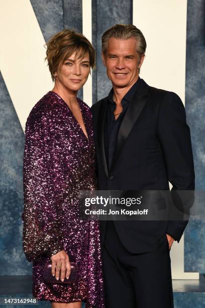 Alexis Knief and Timothy Olyphant attend the 2023 Vanity Fair Oscar Party Hosted By Radhika Jones at Wallis Annenberg Center for the Performing Arts...