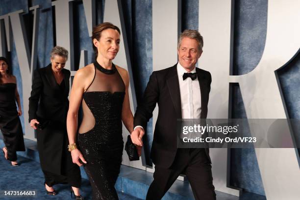 Anna Elisabet Eberstein and Hugh Grant attend the 2023 Vanity Fair Oscar Party Hosted By Radhika Jones at Wallis Annenberg Center for the Performing...