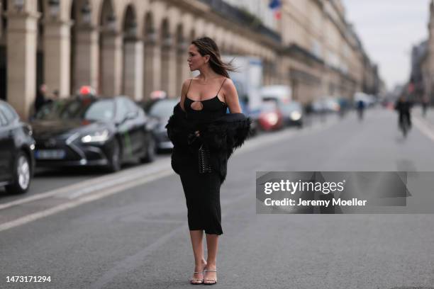 Yasemin Ögün seen wearing black strapless glitter Miu Miu dress, silver Amina Muaddi glitter heels, small black Miu Miu bag with rivet, silver...