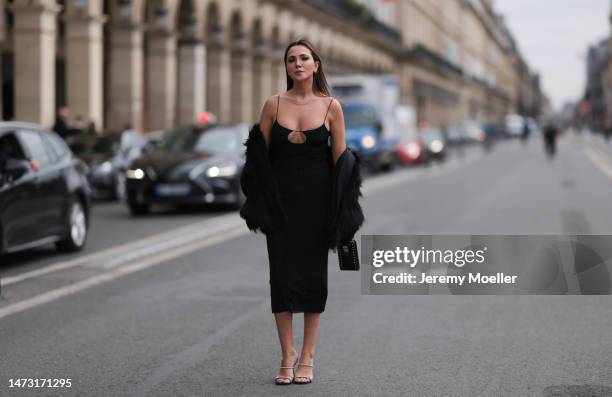 Yasemin Ögün seen wearing black strapless glitter Miu Miu dress, silver Amina Muaddi glitter heels, small black Miu Miu bag with rivet, silver...