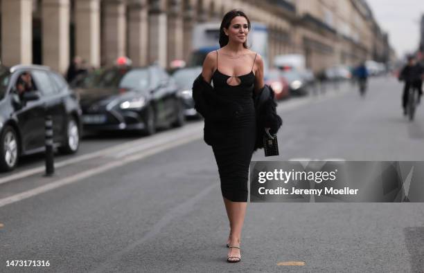 Yasemin Ögün seen wearing black strapless glitter Miu Miu dress, silver Amina Muaddi glitter heels, small black Miu Miu bag with rivet, silver...