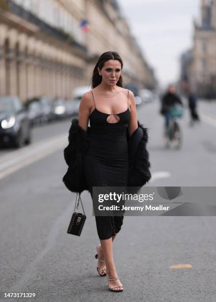 Yasemin Ögün seen wearing black strapless glitter Miu Miu dress, silver Amina Muaddi glitter heels, small black Miu Miu bag with rivet, silver...