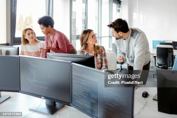 Multiple Monitors Working Photos and Premium High Res Pictures - Getty ...