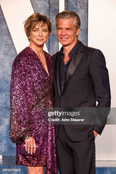 Alexis Knief and Timothy Olyphant attend the 2023 Vanity Fair Oscar Party Hosted By Radhika Jones at Wallis Annenberg Center for the Performing Arts...