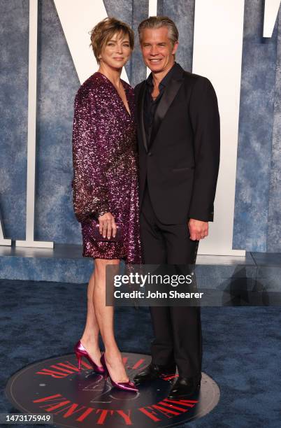 Alexis Knief and Timothy Olyphant attend the 2023 Vanity Fair Oscar Party Hosted By Radhika Jones at Wallis Annenberg Center for the Performing Arts...