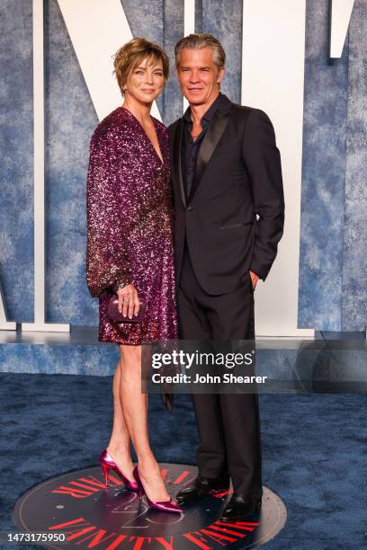 Alexis Knief and Timothy Olyphant attend the 2023 Vanity Fair Oscar Party Hosted By Radhika Jones at Wallis Annenberg Center for the Performing Arts...