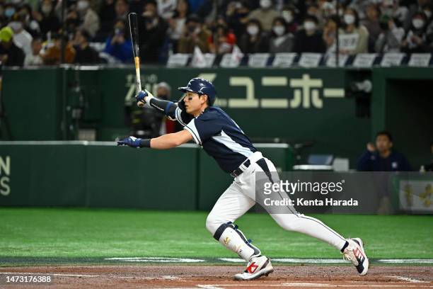 Jung Hoo Lee of Team Korea RBI single to make it 1-0 in the first inning during the World Baseball Classic Pool B game between Korea and China at...