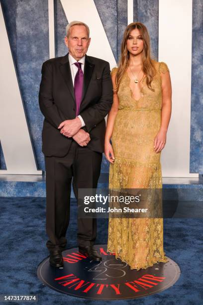 Steve Tisch and a guest attend the 2023 Vanity Fair Oscar Party Hosted By Radhika Jones at Wallis Annenberg Center for the Performing Arts on March...