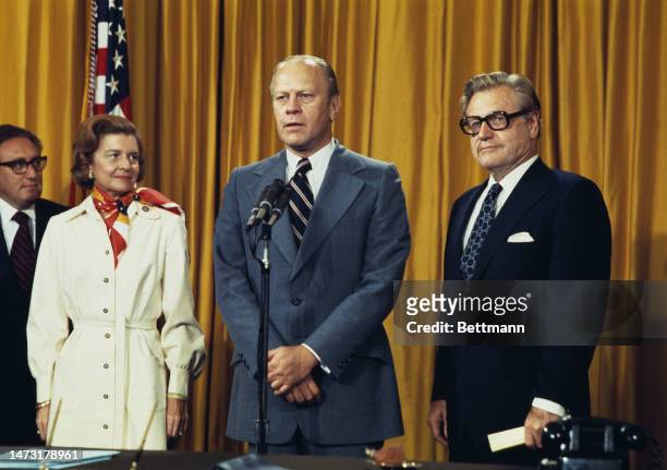 President Gerald Ford nominates Nelson Rockefeller as the new Vice President in Washington on August 20th, 1974. Also pictured are Secretary of State...