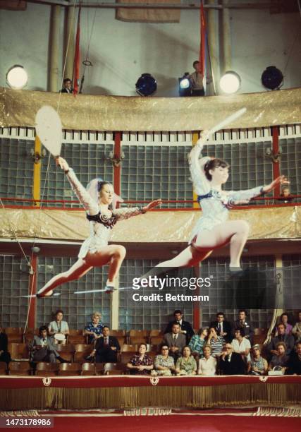 First Lady Pat Nixon attends a tightrope walking performance at the Moscow Circus School in Russia on July 2nd, 1974.