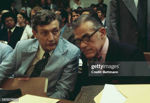 Chief majority counsel John Doar talks with former minority counsel Albert Jenner at a House Judiciary Committee meeting in Washington on July 26th,...