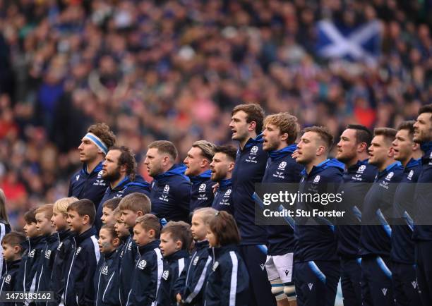 The Scotland team sing the national anthem during the Six Nations Rugby match between Scotland and Ireland at Murrayfield Stadium on March 12, 2023...