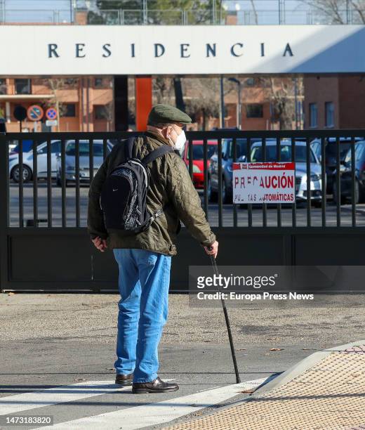 An elderly man walks in front of the Francisco de Vitoria residence on March 13 in Alcala de Henares, Madrid, Spain. The health inspection of the...