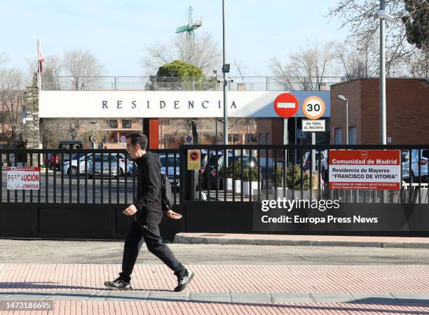 Man walks in front of the Francisco de Vitoria residence on March 13 in Alcala de Henares, Madrid, Spain. The health inspection of the Alcala de...