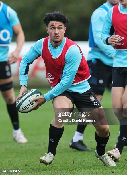 Marcus Smith of England passes the ball during a training session at Pennyhill Park on March 13, 2023 in Bagshot, England.