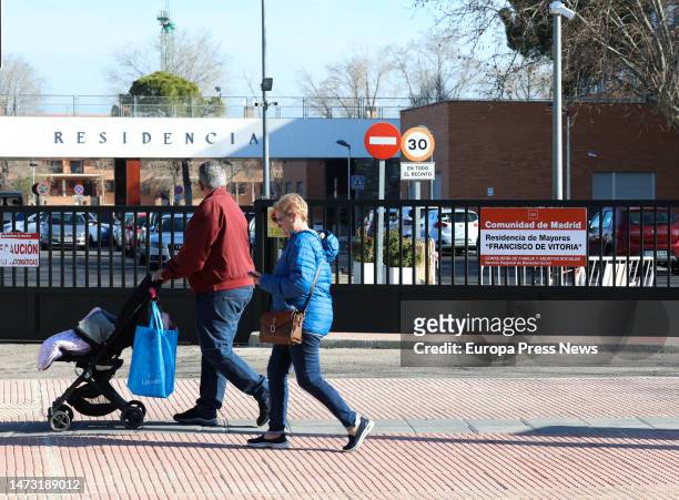 Married couple walks in front of the Francisco de Vitoria residence, on 13 March, 2023 in Alcala de Henares, Madrid, Spain. The health inspection of...