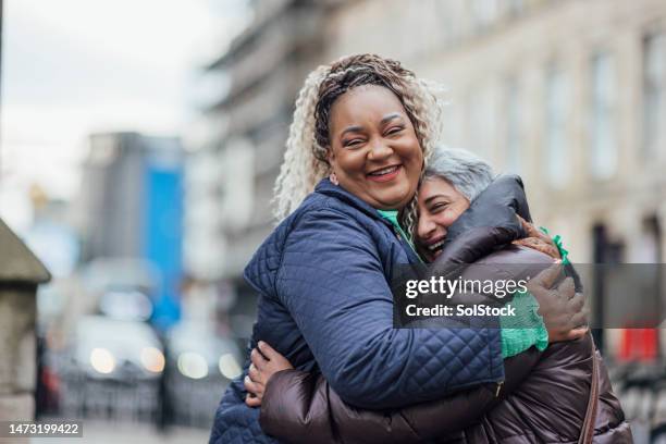 friendship between coworkers - black communities stock pictures, royalty-free photos & images