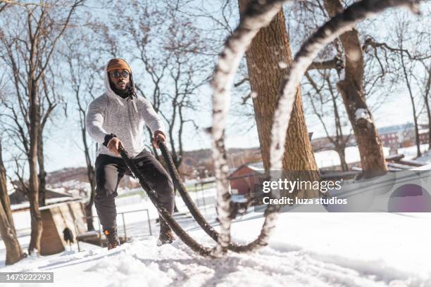 Men Blasting Ropes 520 Battle Ropes Outdoors Stock Photos, High-Res Pictures, and Images ...
