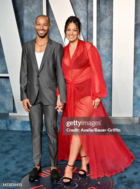 Justin Ervin and Ashley Graham attend the 2023 Vanity Fair Oscar Party hosted by Radhika Jones at Wallis Annenberg Center for the Performing Arts on...