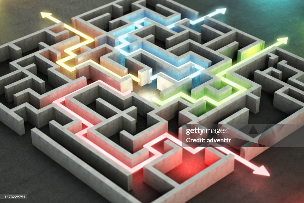 Four different colored glowing lines and arrows showing different ways out of the complex maze