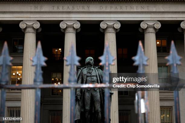 Statue of Alexander Hamilton is seen outside the U.S. Department of Treasury building as they joined other government financial institutions to bail...