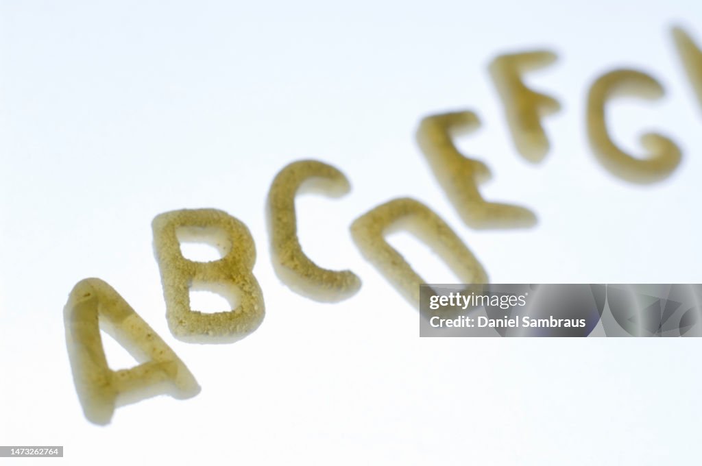 Alphabet Pasta letters on white background