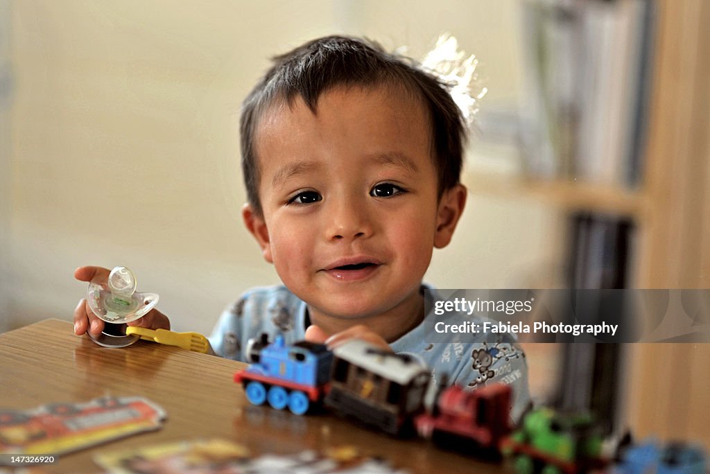 Playing with toy train
