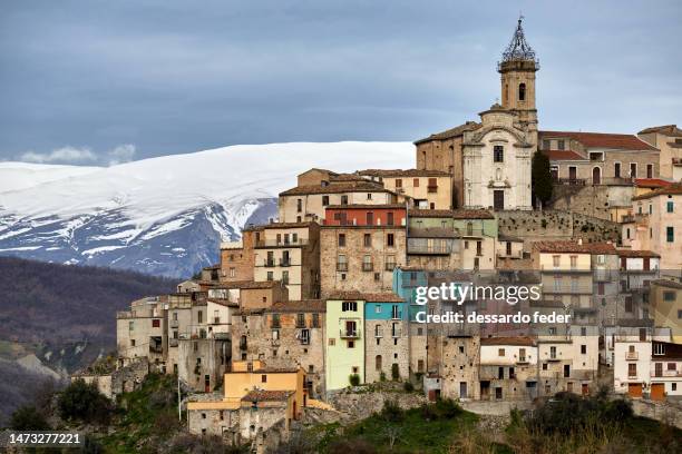 village perched on the mountain - abruzzo stock pictures, royalty-free photos & images