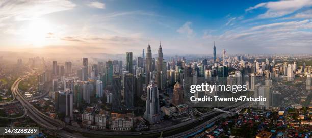 panorama aerial view of skyscrapers in kuala lumpur city in the morning - kuala lumpur culture stock pictures, royalty-free photos & images
